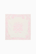 Pink and white patterned square scarf on a white background